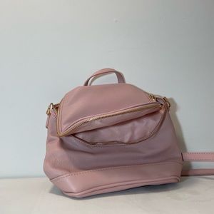 spacious mini pink backpack with gold detailing 🦌